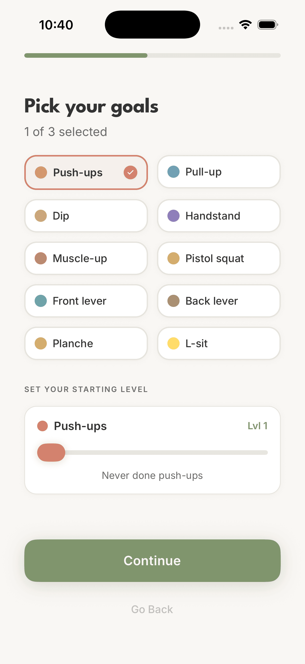 Pick your goals screen showing 10 calisthenics skills including push-ups, pull-ups, handstands, muscle-ups, and front levers with starting level selector